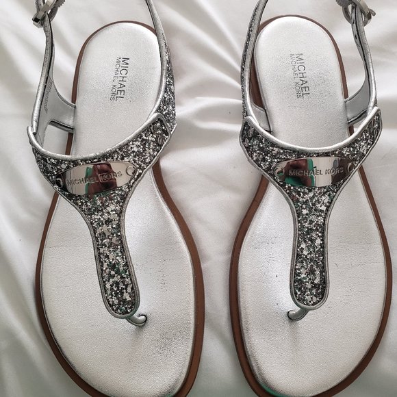 Michael Kors Shoes - NWOT: Michael Kors MK Plate Flat Thongs in sparkly silver!